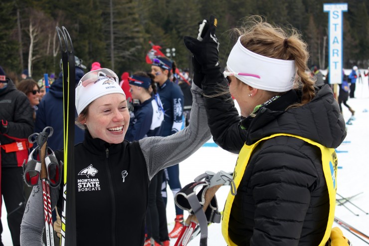 Cambria McDermott, fourth place and top American finisher in the 2015 NCAA Championship 5 k, high fives Montana State University Head Coach Kristina Trygstad-Saari.   