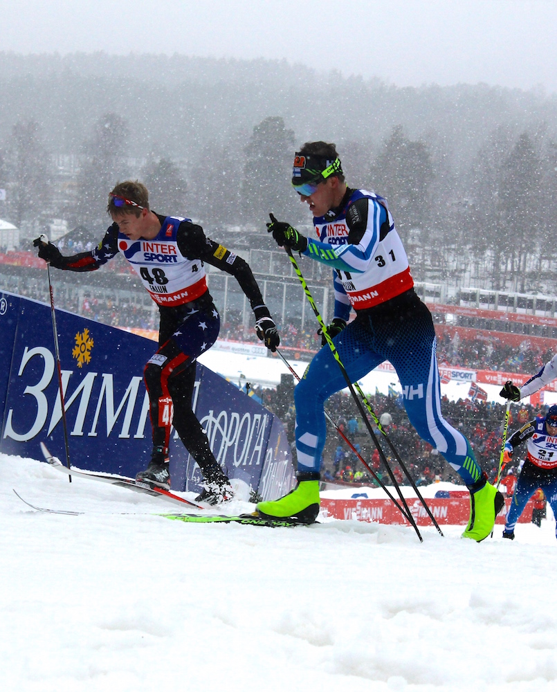 Erik Bjornsen (right) skis with Finland's Sami Jauhojaervi in the 50 k classic mass start.