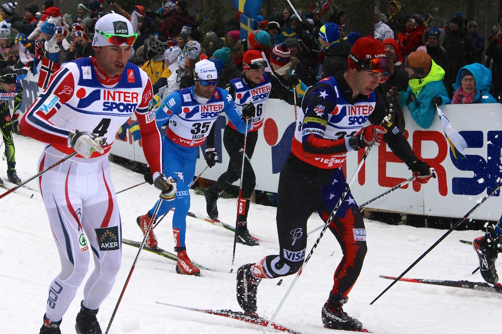 Noah Hoffman (right) of the U.S. Ski Team strides along with eventual race winner Petter Northug of Norway at 34 k into the 50 k classic mass start in Falun, Sweden.