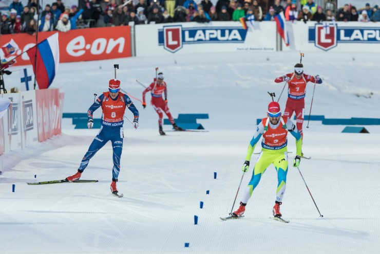 Slovenia's Jakov Fak (r) attacked on the last lap and held off Ondrej Moravec of the Czech Republic (l), in second, and Norway's Tarjei Bø (back r), in third, as well as Norway's Ole Einar Bjørndalen (back l), in fourth, to win the men's 15 k mass start on the last day of 2015 IBU World Championships in Kontiolahti, Finland. (Photo: Kontiolahden Urheilijat/Risto Kuittinen)