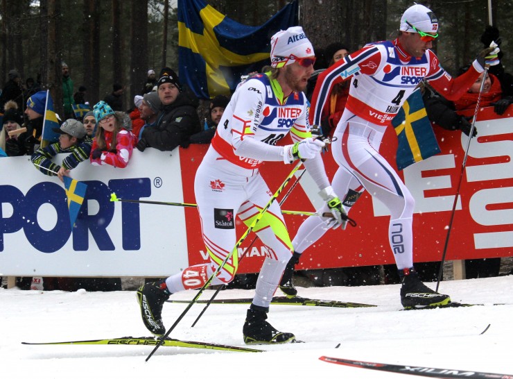 Canada's Graeme Killick skiing with eventual winner, Petter Northug of Norway (r), around 14 k of the men's 50 k classic mass start at 2015 World Championships. Killick went on to place 19th for a career-best international result. 