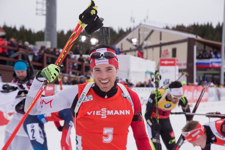 Nathan Smith celebrates after becoming just the second Canadian man to ever win a biathlon World Cup, after winning Saturday's 12.5 k pursuit in Khanty-Mansiysk, Russia. (Photo: Biathlon Canada/NordicFocus.com)