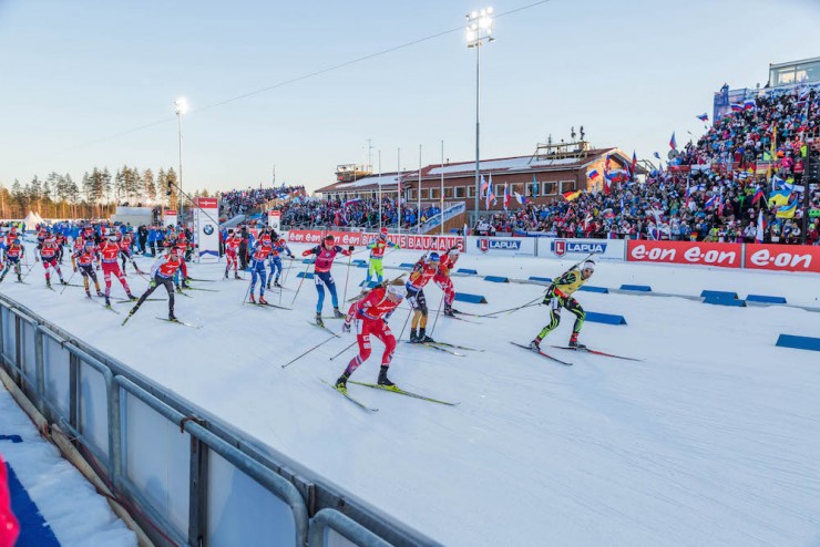 Start of the men's 15 k mass start on Sunday at IBU World Championships in Kontiolahti, Finland, with Martin Fourcade (r) and Norway's Johannes Thingnes Bø (l) leading and Canada's Nathan Smith (l) near the front. Smith went on to miss two on the first shooting stage and one in the third stage to finish 23rd overall. (Photo: Kontiolahden Urheilijat/Kari Kuninkaanniemi) 