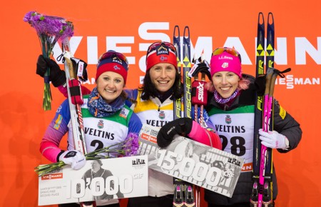 From l-r, Norway's Ingvild Flugstad Østberg, Marit Bjørgen, and American Kikkan Randall on the podium after the 1.5-kilometer freestyle sprint in Lahti, Finlad. Bjørgen won the event by 0.14 seconds over Østberg, while Randall was close behind in third and earned her first World Cup podium of the season. (Photo: Fischer/Nordic Focus) 