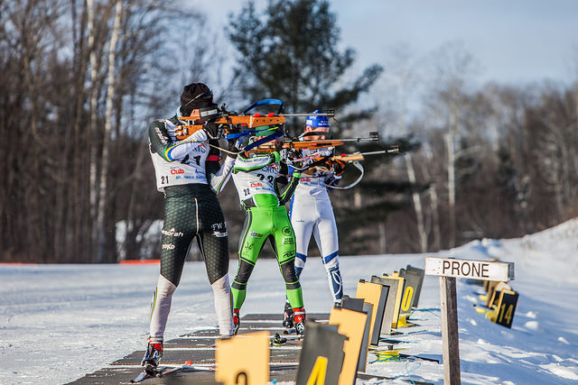 Patrick Johnson of the Auburn Ski Club (foreground) shooting at IBU Cup Trials in Mount Itasca, Minnesota, in December. (Photo: Jake Ellingson/flickr)