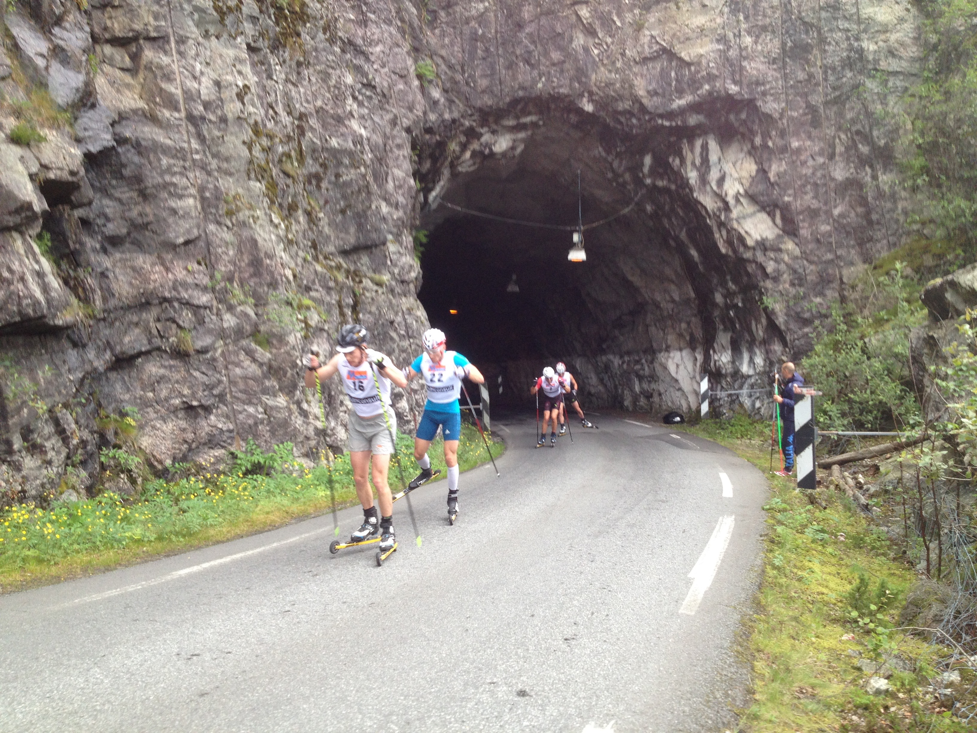 Heikkinen leading Legkov, Manificat, and Tarjei Bø out of a kilometer-long tunnel early in the race. (Photo: Matthias Ahrens)