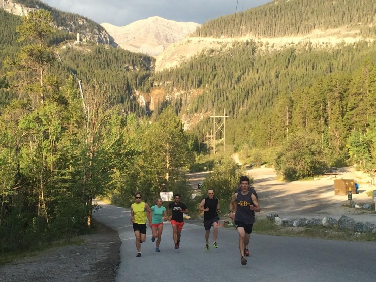 WinSport Junior XC Team athletes (from left to right) Peter Hicks, Morgan Rogers, Jasper Mackenzie, Eric Byram, Ewan Craig, and Alec Stapff push up a hill on Spray Lakes Road in Canmore, Alberta, during an intensity workout following a long block of volume. (Photo: Eric de Nys)