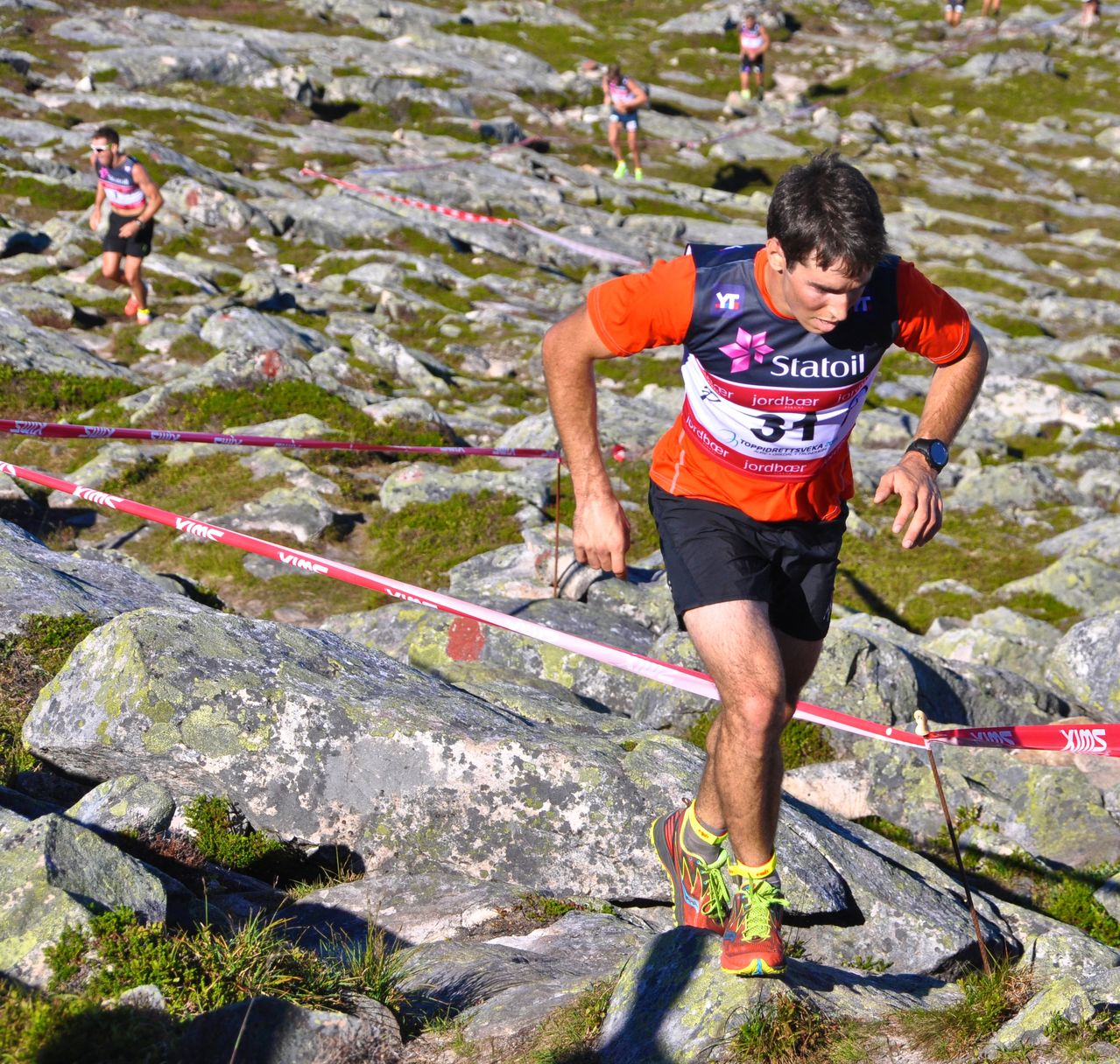 Noah Hoffman (U.S. Ski Team) racing to third in the Fonna Opp, the hill climb footrace that opened the 2015 Toppidrettsveka in Aure, Norway. Norway's Didrik Tønseth was first to the top in 28:53.5, and Sweden’s Martin Johansson placed second, 13 seconds back, while Hoffman was 1:02.5 back in third. (Photo: USSA)
