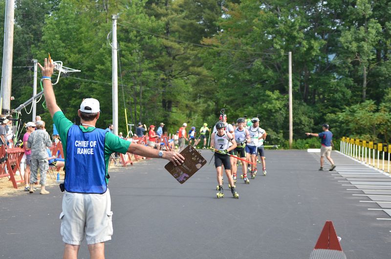 Nathan Smith of the Canadian national team leading the men onto the newly paved range in the mass start. (Photo: Paul Bierman)