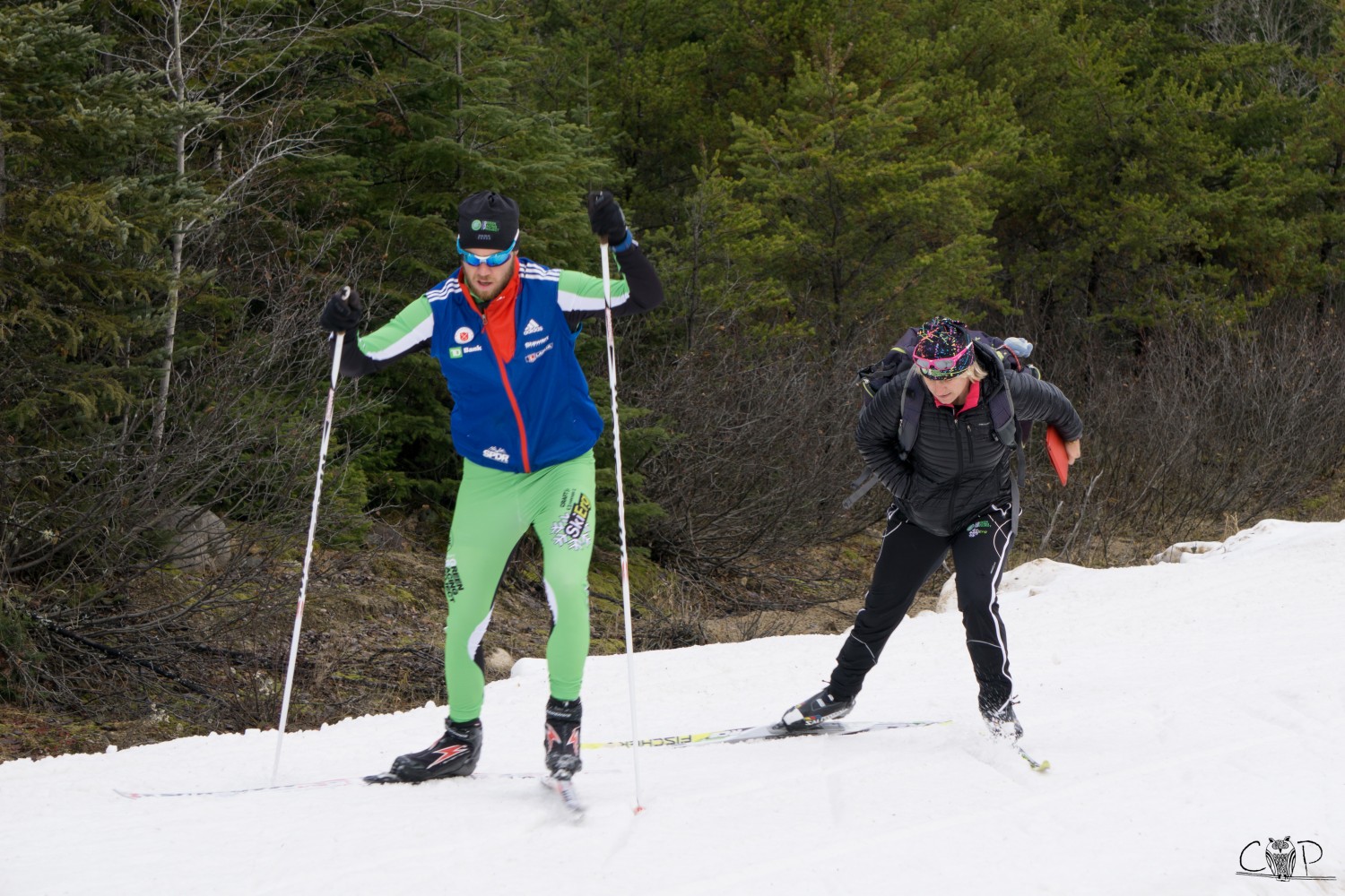 Pepa Miloucheva skates behind CGRP biathlete Casey Smith while at a training camp at La Forêt Montmorency in Quebec. (Photo: Caitlin Patterson)