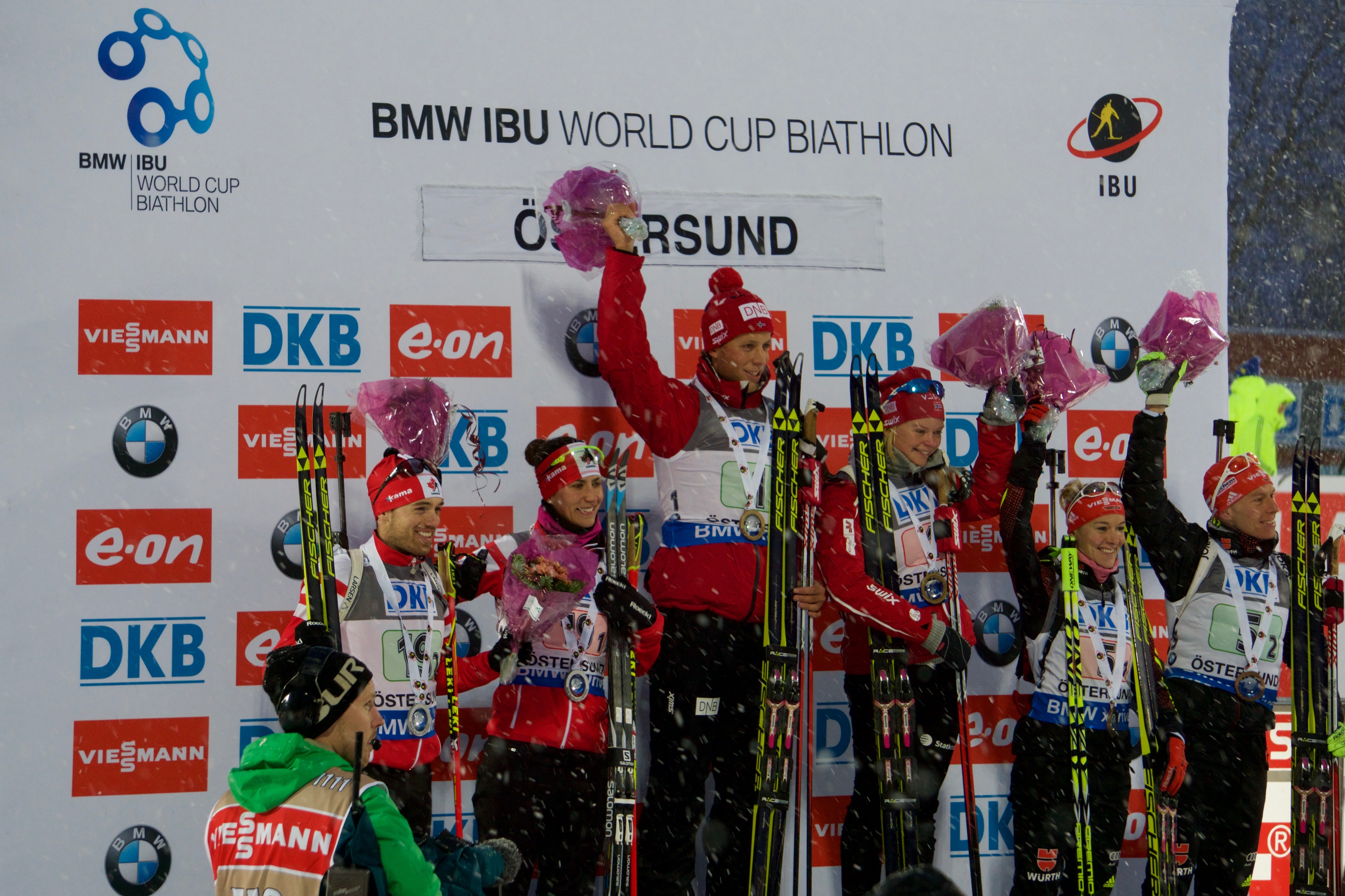 Nathan Smith and Rosanna Crawford (left) on the podium in Ostersund, Sweden, after placing second in the single mixed relay to open the 2015-2016 season. (Photo: Garth Jenkins)