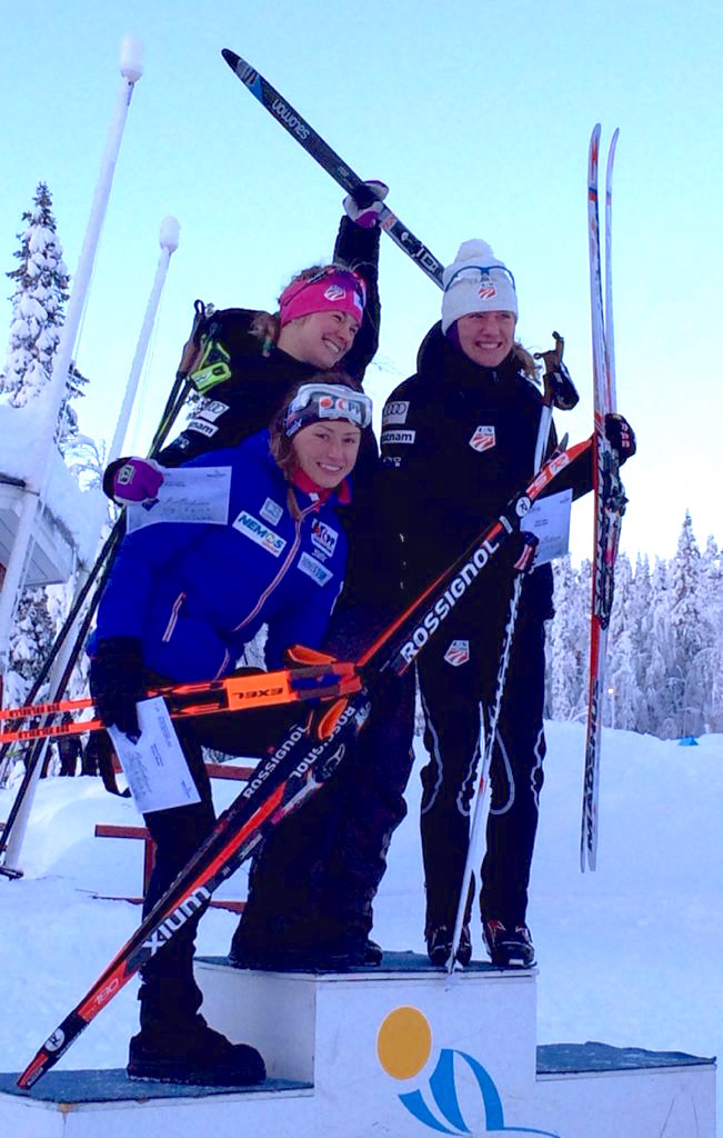 Jessie Diggins stands atop the podium with Czech runner-up Petra Novakova (l)  and U.S. teammate Caitlin Gregg (r), who placed third, after the women's 10 k freestyle in Gällivare, Sweden. (Photo: USSA)