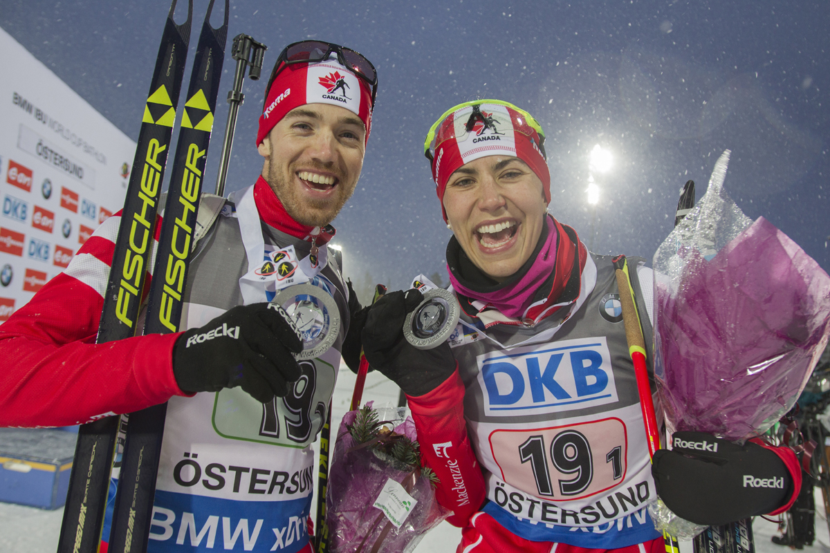 Nathan Smith and Rosanna Crawford celebrate their second-place finish in the World Cup single mixed relay in Oestersund, Sweden. (Photo: Fischer/NordicFocus)