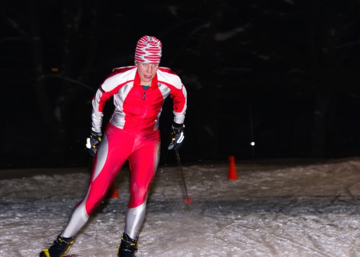 An athlete trains at night on the illuminated trails at the Weston Ski Track in Weston, Mass. (Photo: Jamie Doucett)