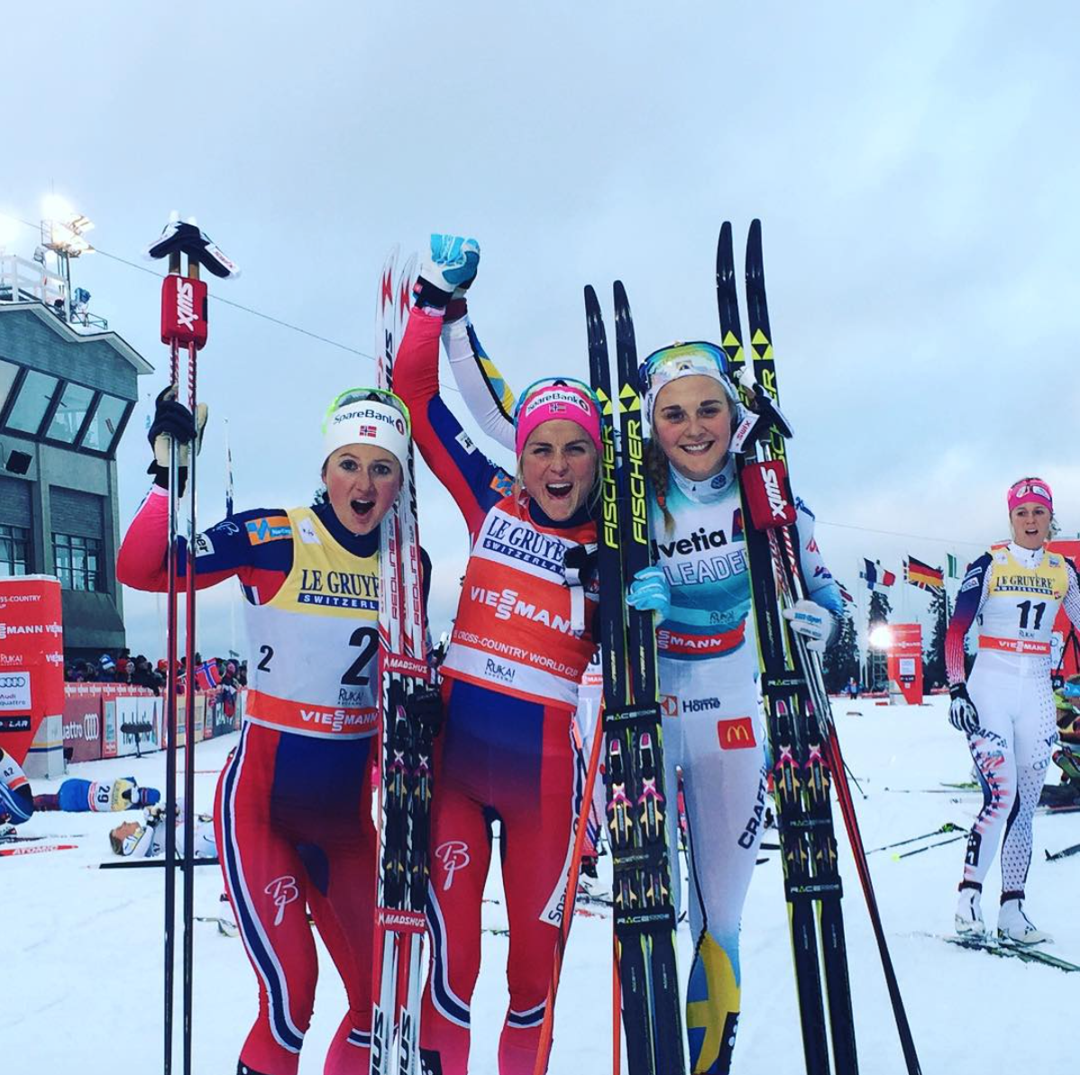 Therese Johaug of Norway (center) celebrates the overall mini-tour win in Kuusamo, Finland, while Stina Nilsson (Sweden, right) and Ingvild Flugstad Ørtberg (Norway, left) take second and third and prove their distance-skiing chops. (Photo: FIS Cross Country / Instagram)