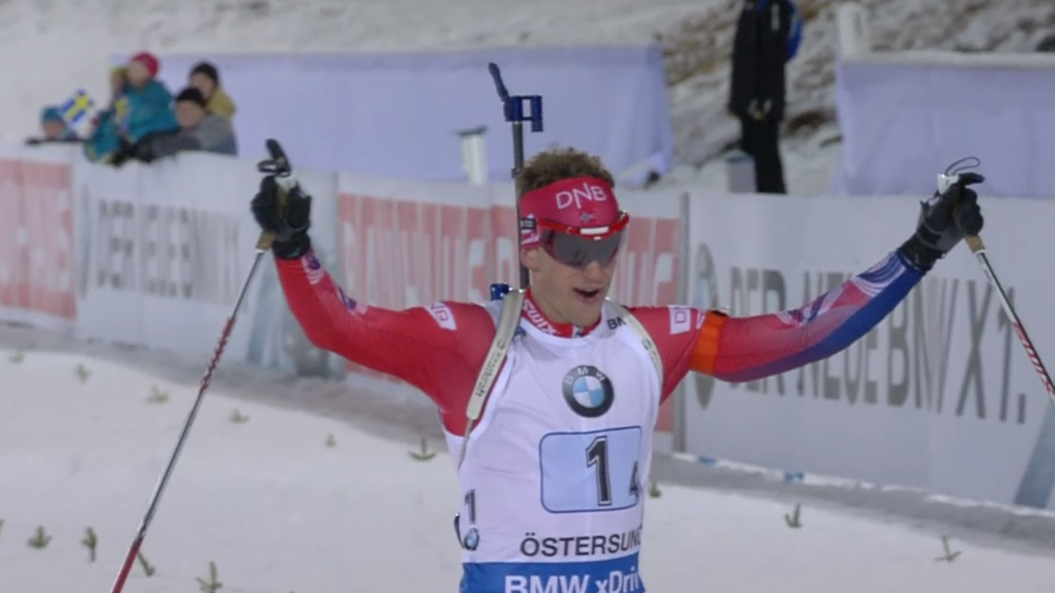 Tarjei Bø celebrating as he crossed the finish line to give Norway a second win on the day.