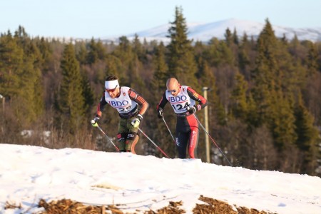 Germany's Jonas Dobler leads Tord Asle Gjerdalen in the first race of the 2015/2016 season, a 15 k classic FIS race in Beitostølen, Norway. Dobler finished eighth and Gjerdalen was 15th. (Photo: Eirik Lund Røer/SKIsport)