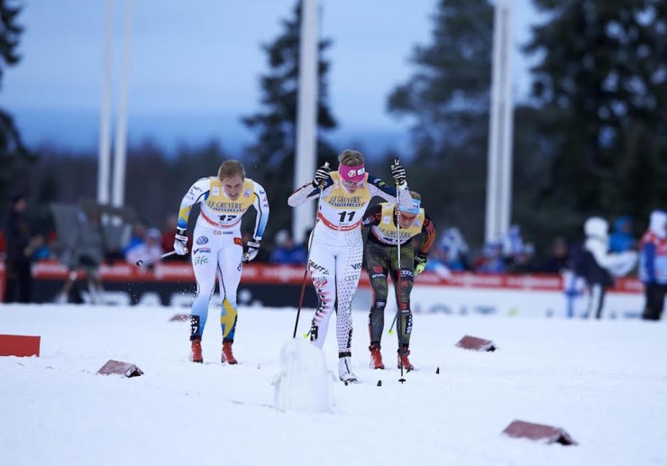 Sadie Bjornsen (c) skis with Sweden's Hanna Falk (l) and Germany's Nicole Fessel (r) during the women's 10 k classic pursuit on the last day of the Ruka Triple in Kuusamo, Finland. Bjornsen placed 14th in the first World Cup and mini tour of the season. (Photo: Fischer/NordicFocus)  