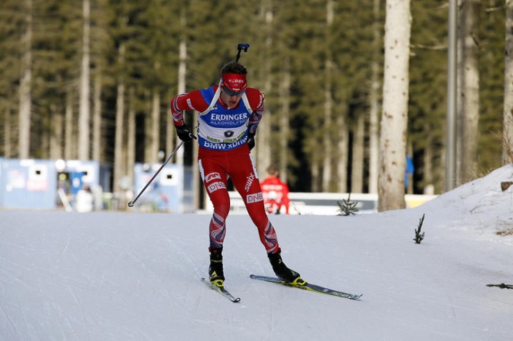 Norway’s Tarjei Bø racing to ninth on Thursday at the IBU World Cup sprint in Pokljuka, Slovenia. (Photo: IBU/Kvetoslav Frgal)