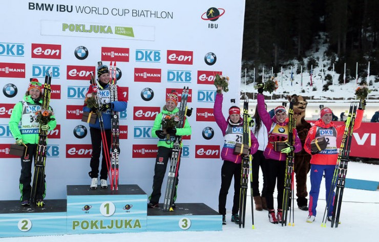 The women's top six at the flower ceremony following the IBU World Cup sprint in Pokljuka, Slovenia, with Marie Dorin Habert of France in first, Germany's Laura Dahlmeier and Franziska Hildebrand in second and third, respectively, Veronika Vitkova and Gabriela Soukalova of the Czech Republic in fourth and fifth, and American Susan Dunklee (far right) in sixth. (Photo: IBU/Kvetoslav Frgal) 