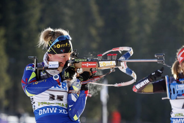 France's Marie Dorin Habert takes aim during the standing stage of Friday's sprint at the IBU World Cup in Pokljuka, Slovenia. She cleaned the two-stage race and won by 1.1 seconds. (Photo: IBU/Kvetoslav Frgal) 