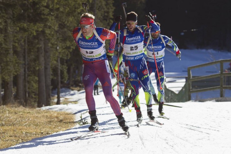 American Lowell Bailey (l) leads eventual-winner Jean-Guillaume Béatrix (c) of France, and Simon Fourcade during Sunday's 15 k mass start at the IBU World Cup in Pokljuka, Slovenia. While Beatrix won by 0.3 seconds over Norway's Emil Hegle Svendsen, Bailey placed 23rd behind U.S. teammate Tim Burke in 22nd. (Photo: USBA/NordicFocus)