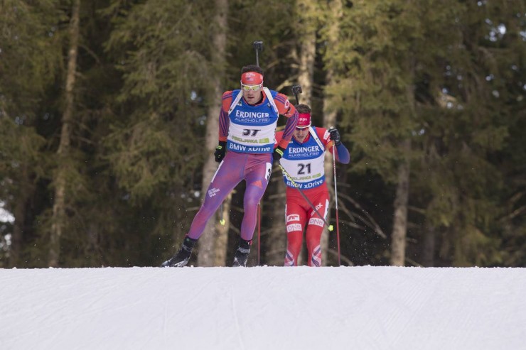 Tim Burke (US Biathlon) leads Norway's Emil Hegle Svendsen (21) on Thursday in the men's IBU World Cup 10 k sprint in Pokljuka, Slovenia. Svendsen placed 11th and Burke finished 14th. (Photo: USBA/NordicFocus)