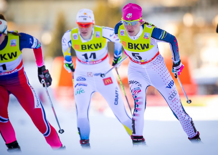 American Sophie Caldwell (r) and Sweden's Ida Ingemarsdotter (14) chase Norway's Ingvild Flugstad Østberg (left, in red) during the first women's quarterfinal of the Davos World Cup freestyle sprint in Switzerland. All three advanced to the semifinals. (Photo: Marcel Hilger)