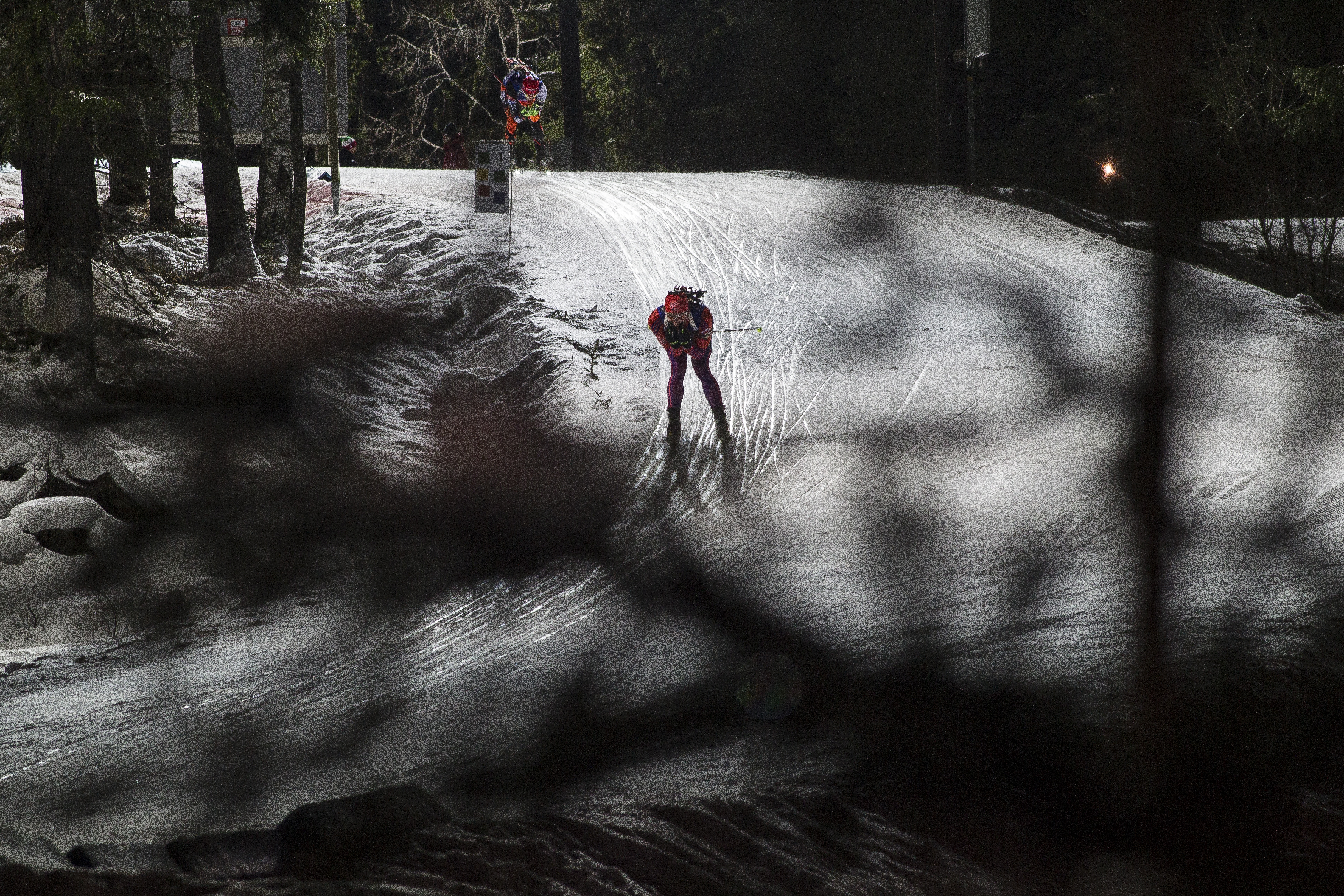 Sean Doherty takes a downhill under the bright lights of the Oestersund trails. The 20-year-old American finished 17th in the first individual World Cup race of the season. (Photo: U.S. Biathlon / NordicFocus)