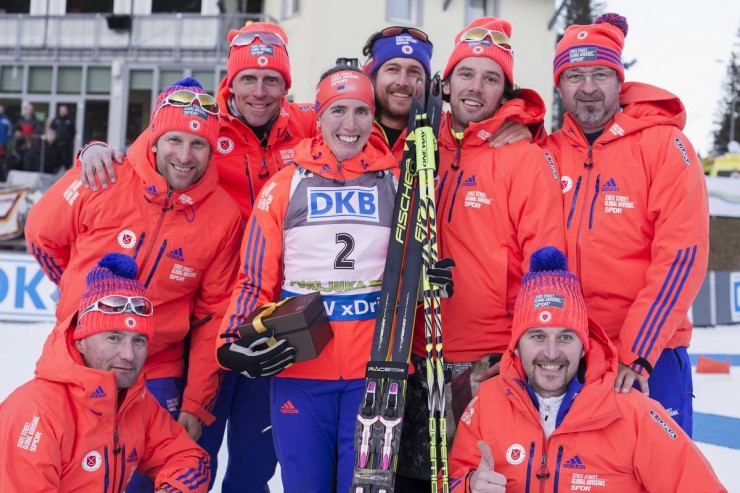 Susan Dunklee and the US Biathlon support crew following Dunklee's sixth-place finish in the women's IBU World Cup sprint in Pokljuka, Slovenia. (Photo: Fischer/NordicFocus)