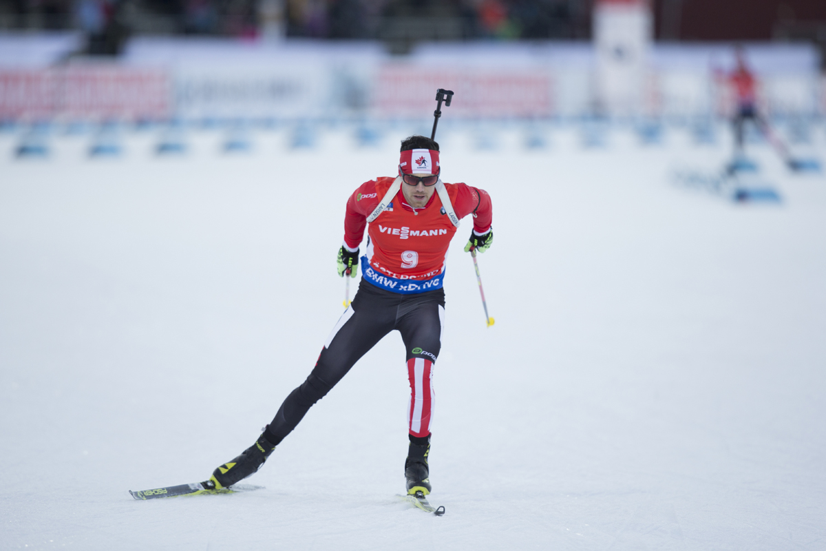 Nathan Smith of Canada racing to 10th in last weekend's 12.5 k pursuit in Ostersund, Sweden. (Photo: Fischer/NordicFocus)