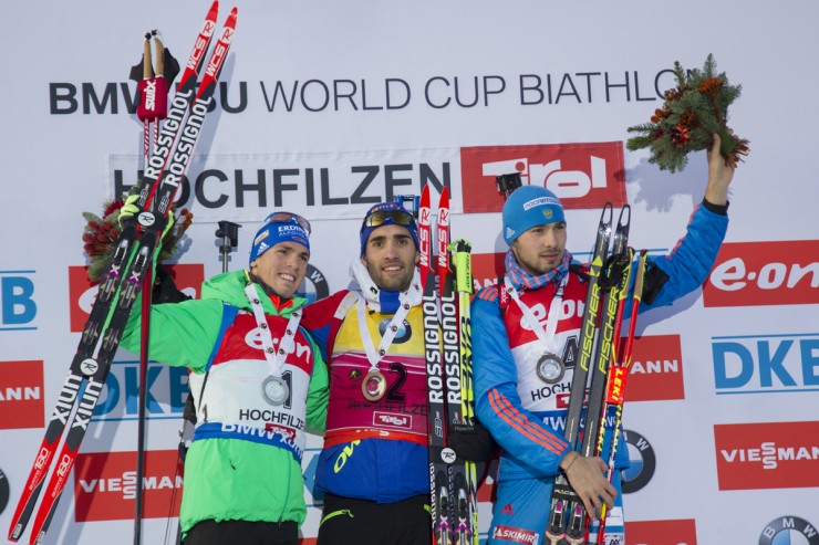 After what runner-up Simon Schempp (l) of Germany called a "psycho race" Schempp, winner Martin Fourcade (c) of France, and Russia's Anton Shipulin (r) shared the pursuit podium at the IBU World Cup in Hochfilzen, Austria. (Photo: Fischer/NordicFocus)