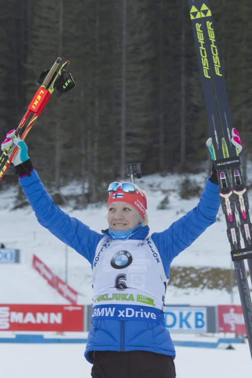 Finland's Kaisa Mäkäräinen celebrates her second IBU World Cup victory of the 2015/2016 season on Sunday at the 12.5 k mass start in Pokljuka, Slovenia. (Photo: Fischer/NordicFocus)