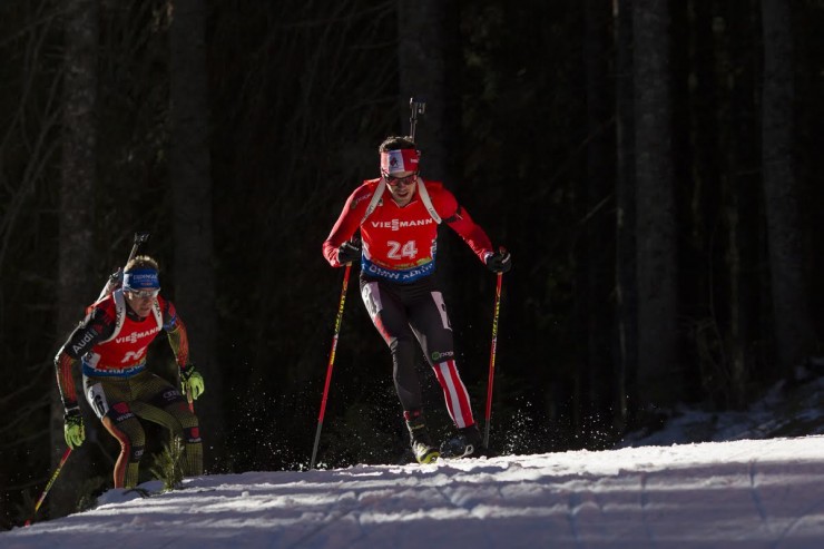 Nathan Smith (Biathlon Canada) racing to 12th in the 15 k mass start at the IBU World Cup in Pokljuka, Slovenia. (Photo: Fischer/NordicFocus)