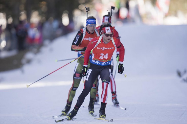 Nathan Smith (Biathlon Canada) racing to 12th in the 15 k mass start at the IBU World Cup in Pokljuka, Slovenia. (Photo: Fischer/NordicFocus)