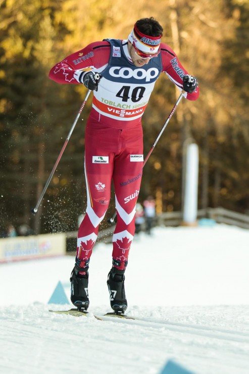 Alex Harvey (Canadian World Cup Team) racing to 16th in the men's World Cup 15 k classic individual start on Sunday in Toblach, Italy. According to coach Justin Wadsworth, it was the first time he double poled a World Cup distance race on skate skis. (Photo: Fischer/NordicFocus)