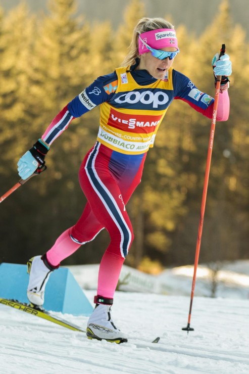 Norway's Therese Johaug racing to a 28.2-second win in the Toblach World Cup 10 k classic on Sunday in Italy. (Photo: Fischer/NordicFocus)