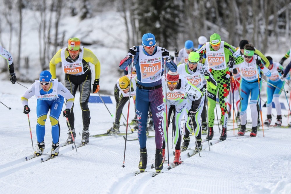 American Andy Newell in bib No. 2003 in the lead pack during the Dolomitenlauf 42 k classic race  FIS Marathon Cup on Saturday in Lienz, Austria.  (Photo: Fischer/NordicFocus)