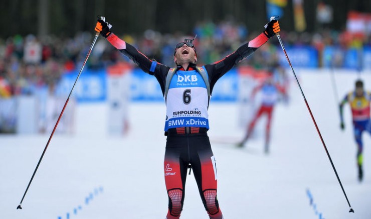 Austrian Simon Eder celebrates his first victory of the season and the third one of his career on Saturday at the IBU World Cup in Ruhpolding, Germany. He won the men's 12.5 k pursuit by 4.2 seconds over Martin Fourcade (not shown). (Photo: IBU/Eberhard Thonfeld) 