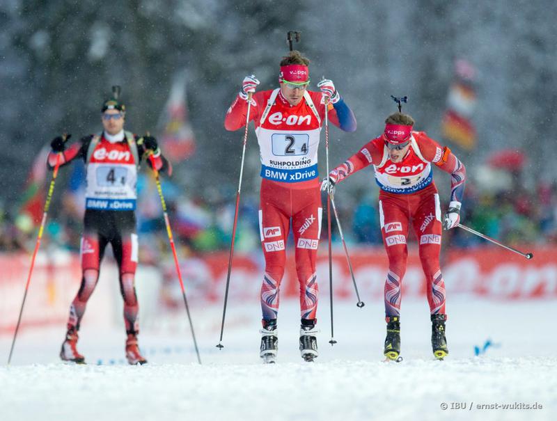 Tarjei Bø tags to Emil Hegle Svendsen; the Norwegian team had a minute lead over the field with one leg to go, and Svendsen finished with a 15-second gap to second place. (Photo: IBU/Ernst Wukits)