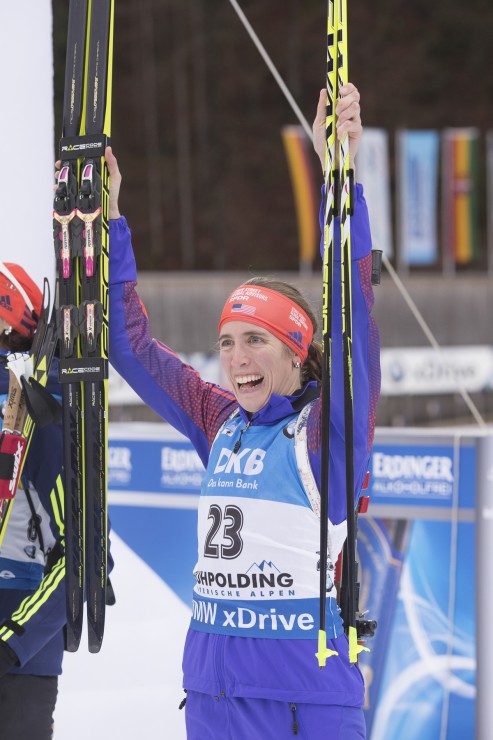 Susan Dunklee (US Biathlon) at the flower ceremony. Dunklee tied a season-best sixth on Sunday in the mass start at the IBU World Cup in Ruhpolding, Germany. (Photo: Fischer/NordicFocus)