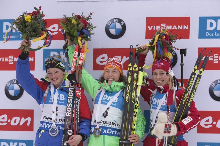 The women's 12.5 k mass start podium at the IBU World Cup in Ruhpolding, Germany: with German winner Laura Dahlmeier (c), France's Marie Dorin Habert in second (l) and Norway's Tiril Eckhoff in third (r). (Photo: Fischer/NordicFocus)
