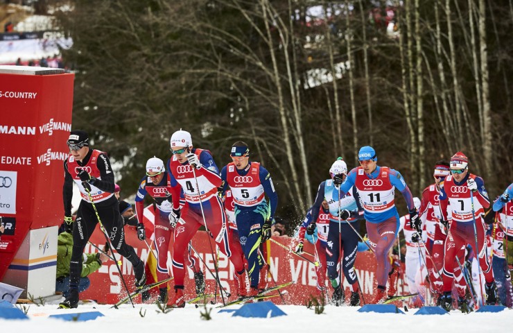 The leaders, including Dario Cologna (SUI), Petter Northug (NOR), Finn Haagen Krogh (NOR) and Alexey Poltoranin (KAZ) pushing the pace during the classic mass start in Oberstdorf (GER). (photo: Fischer/NordicFocus)