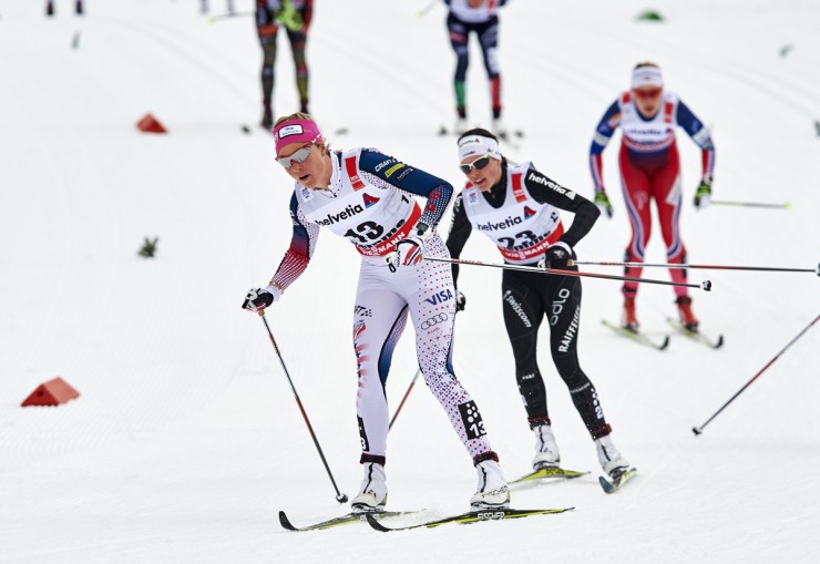 Sadie Bjornsen (U.S. Ski Team) leads Switzerland's Nathalie von Siebenthal during the 10 k classic mass start at Stage 7 of the Tour de Ski in Val di Fiemme, Italy. (Photo: Fischer/NordicFocus)