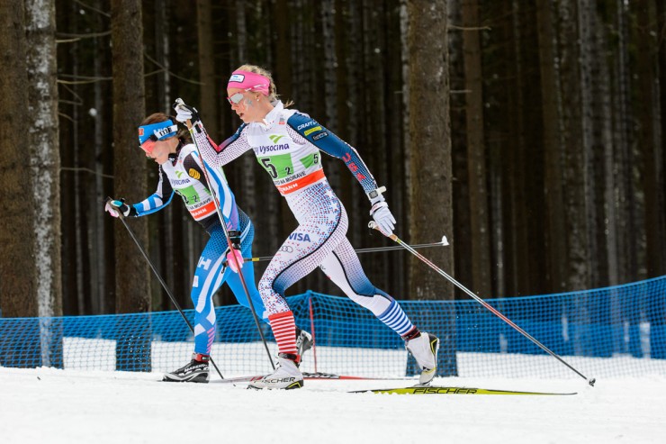 Sadie Bjornsen (in white) racing with Finland's Krista Parmakoski during the second leg of the women's 4 x 5 k World Cup relay on Sunday in Nove Mesto, Czech Republic. (Photo: Fischer/NordicFocus)