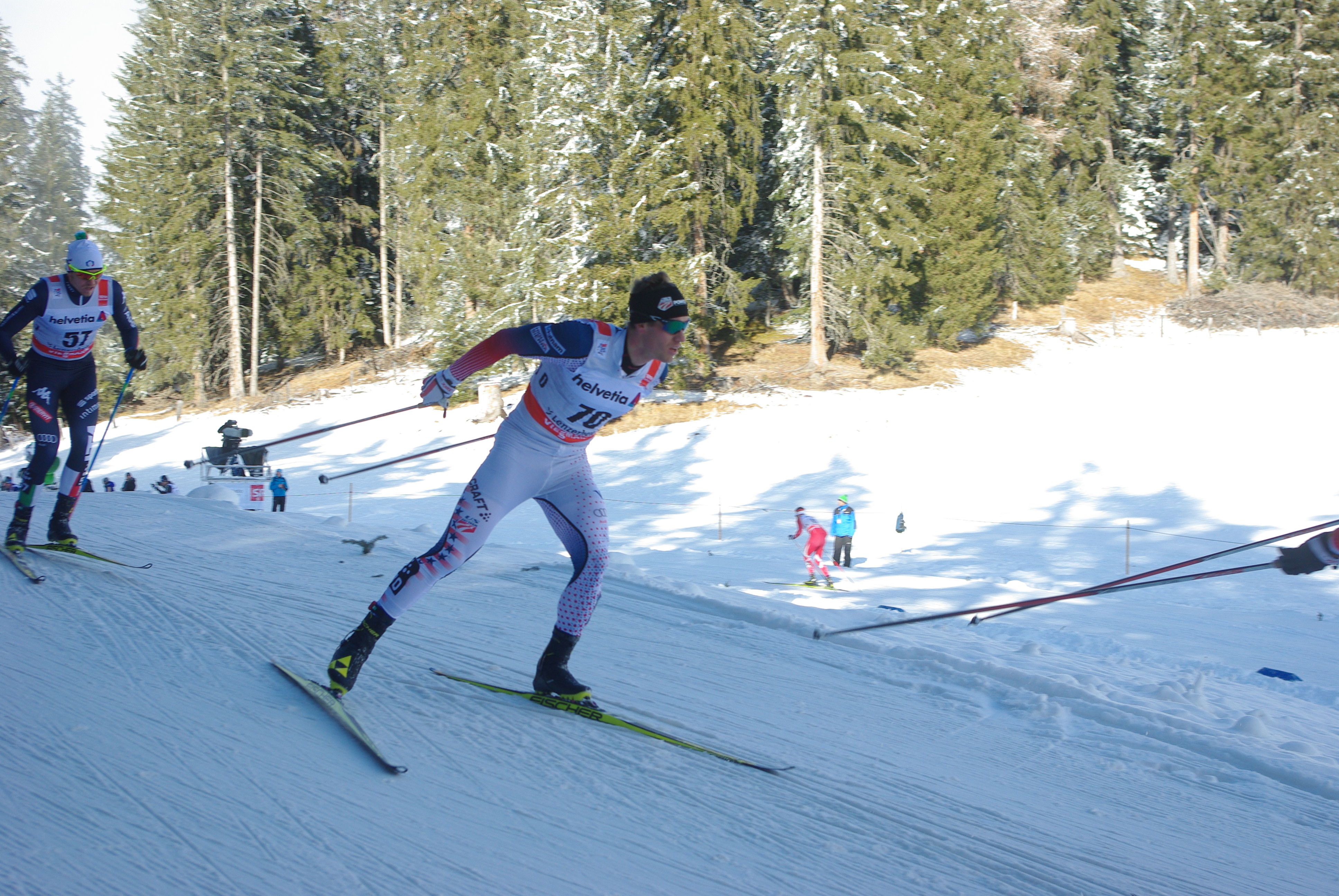 Simi Hamilton of the United States in Sunday's 10 k skate pursuit, the third stage of the Tour de Ski, where he crossed the line in 69th place. "It was a tricky race because with the two big wave starts, you start in the pack... I was able to get to the front of my pack, but when the pace was slow I was hesitant to ski away from that pack because it’s such a big gap to the next one," Hamilton said of the effort.