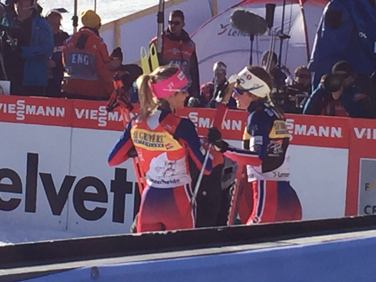 The first- and second-place Norwegians congratulate each other in the finish.