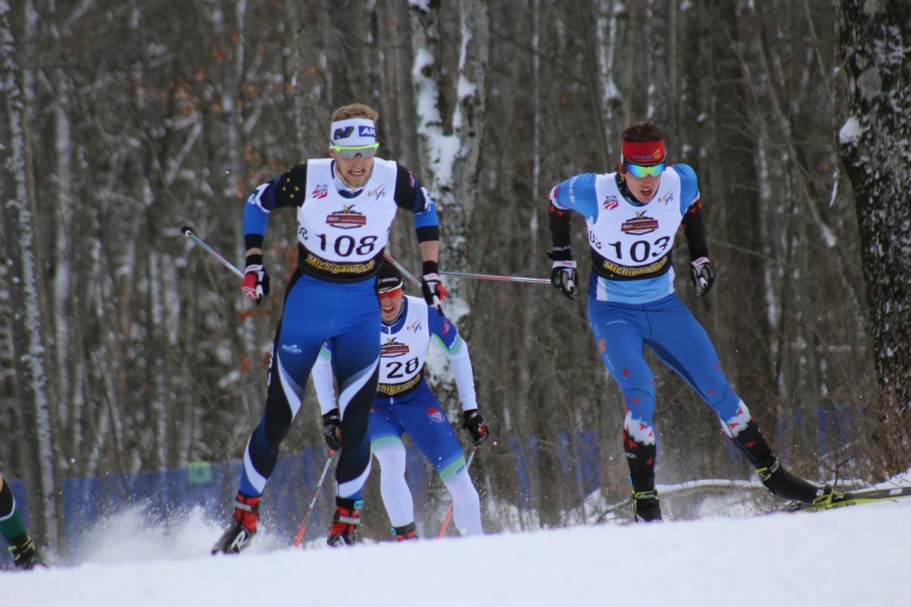 Julien Locke (r, Team Black Jack) challenges APU's Eric Packer at around 400-meters to the finish of the semi-final for the men’s 1.5 k freestyle sprint at 2016 U.S. National Championships in Houghton, Mich. Locke went on to finish third overall.