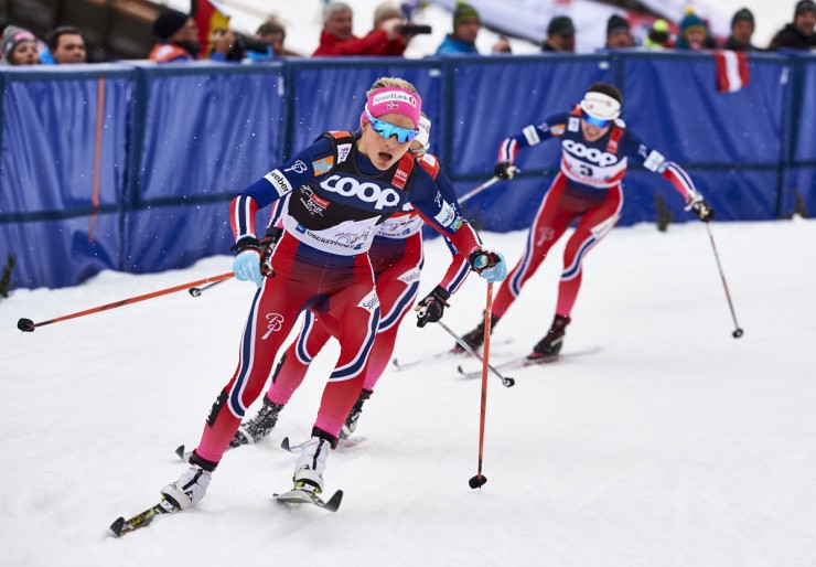 Therese Johaug leads Norwegian teammates Ingvild Flugstad Østberg (behind) and Heidi Weng (r) during the 10 k classic mass start on Wednesday at Stage 5 of the Tour de Ski in Oberstdorf, Germany. Johaug went on win by 9.9 seconds ahead of Østberg. (Photo: Fischer/NordicFocus)