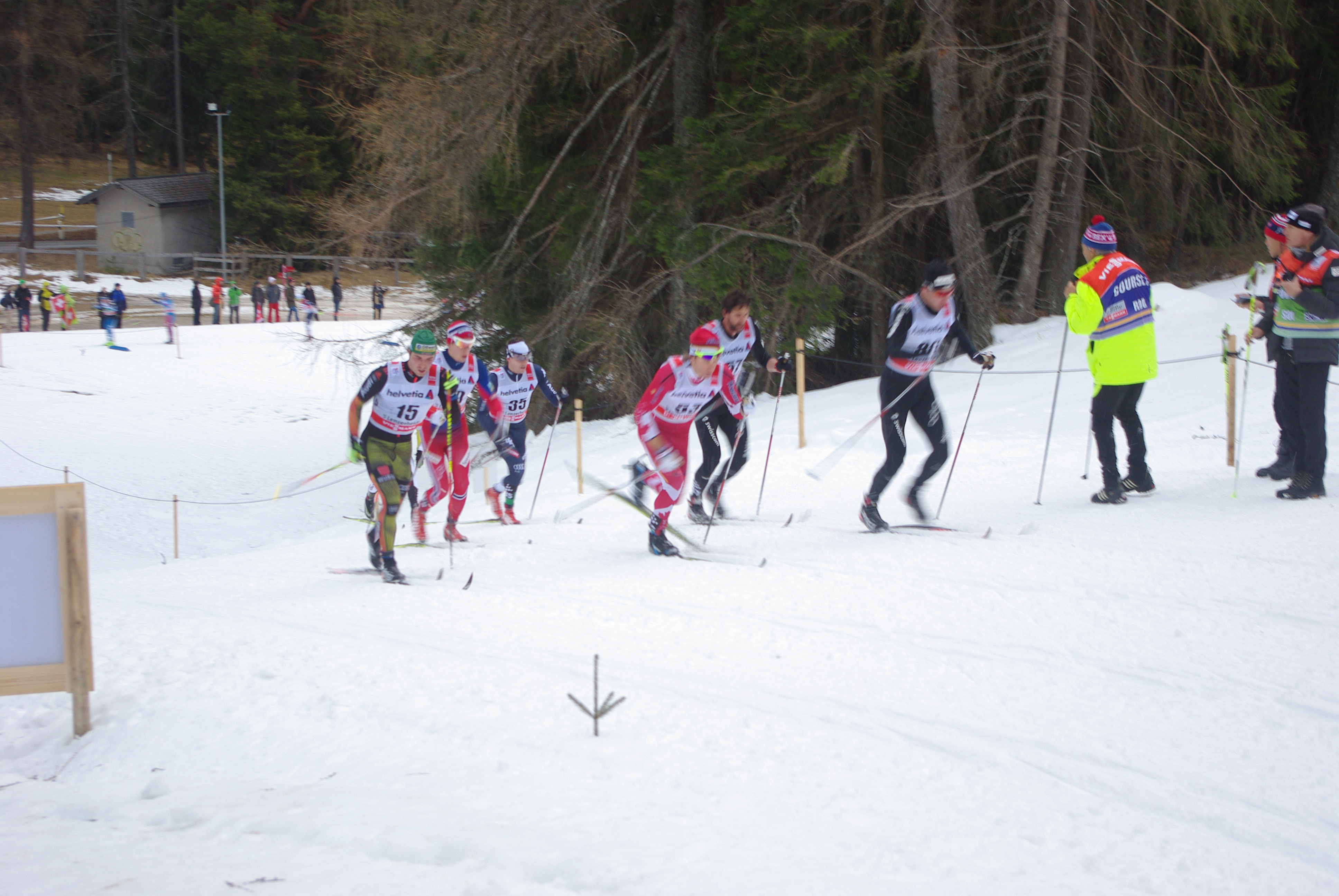 Perfect skis? Devon Kershaw (center in red) slipped on some of the uphills, much like almost every other man in the field. He finished 41st on the day.